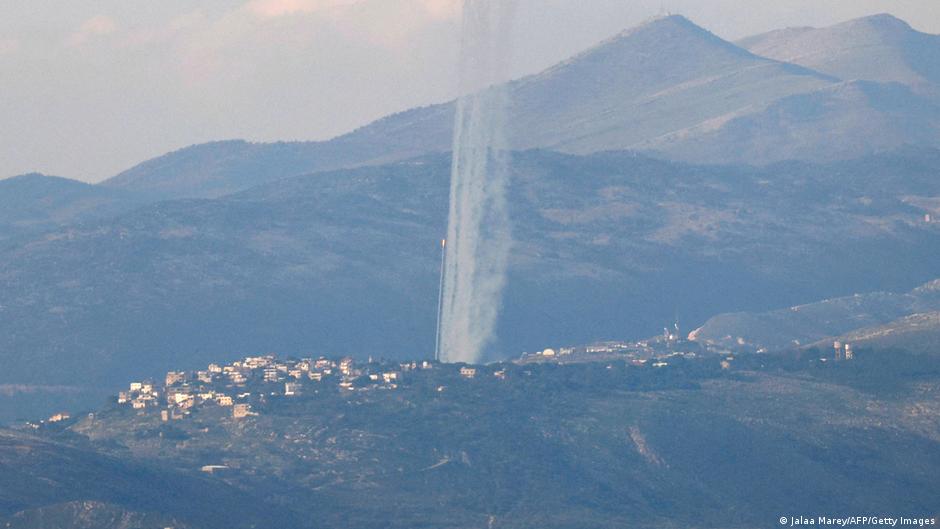 This picture taken from an Israeli position along the border with southern Lebanon shows rockets fired from Lebanon into Israel 