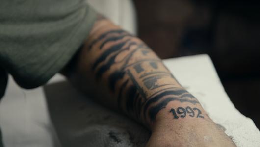Namik Arslan (Photo: Inselfilm Produktion) The tattooed lower arm of a young man